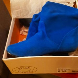 Steve Madden calf high boots.